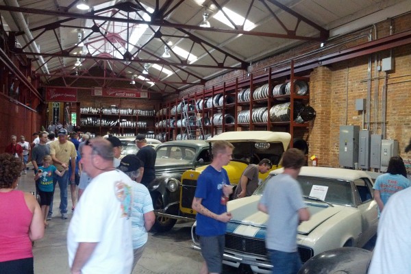 crowds looking at classic cars in Coker museum