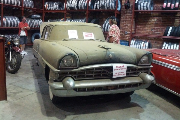 Dusty classic car in a museum