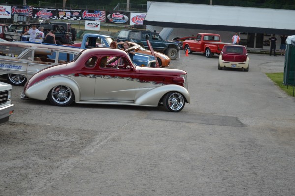 hot rods leaving a classic car show
