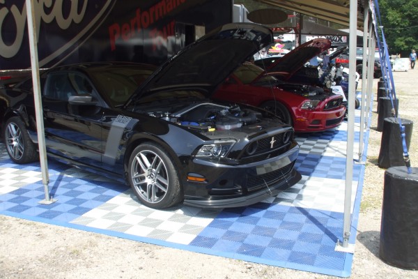 ford mustang display at automotive trade show