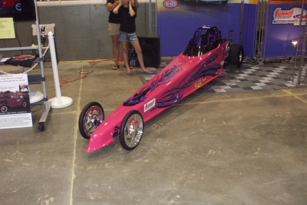 jr dragster on display at automotive trade show