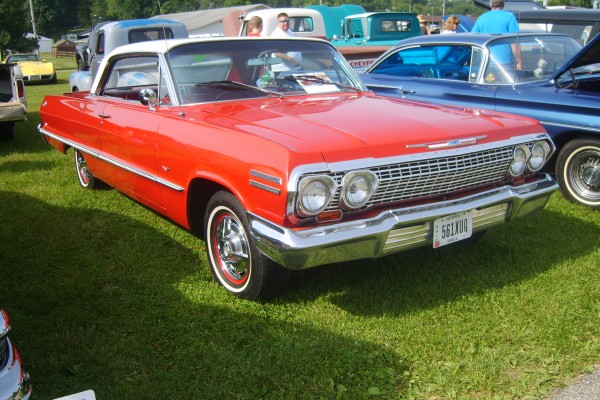 red chevy impala coupe form the 1960s