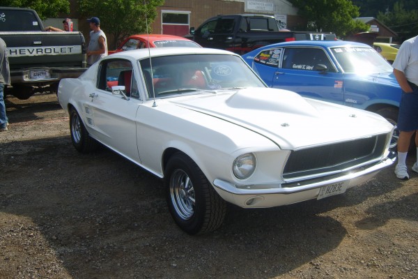 white ford mustang 1967 with teardrop hood