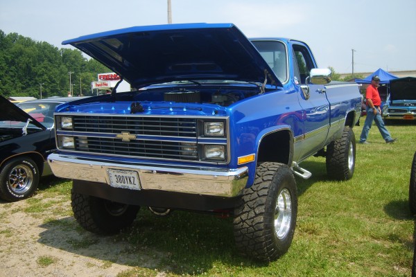 lifted blue chevy Squarebody c10 pickup truck