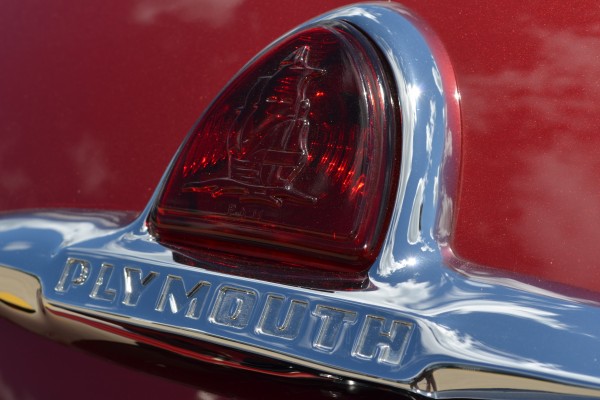 rear taillight hip emblem on a 1947 plymouth hot rod coupe
