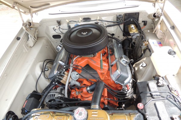 mopar v8 engine in a classic muscle car