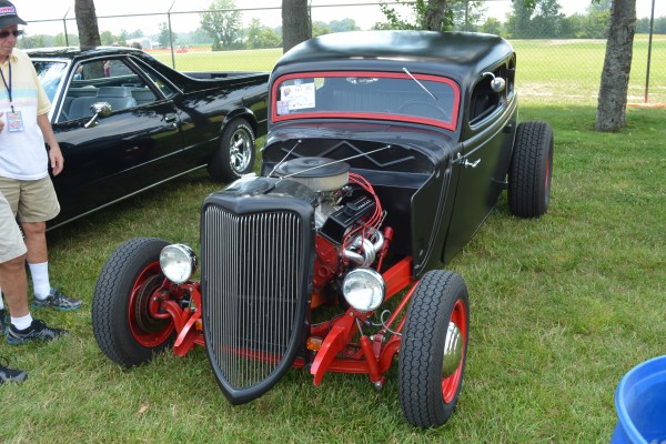 black ford hotrod with sbc v8 engine