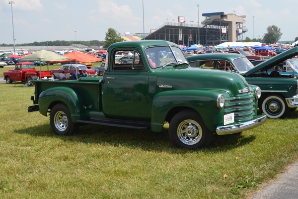 green chevy 3100 pickup truck with custom wheels