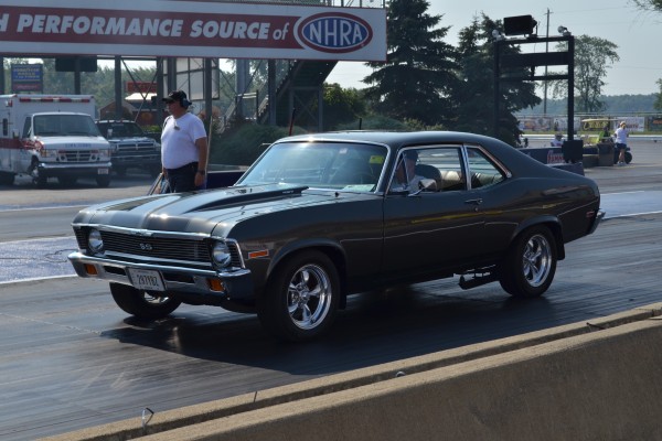 chevy nova ss at the beginning of a drag race