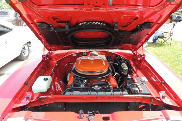 Air grabber hood and mopar v8 in a classic muscle car