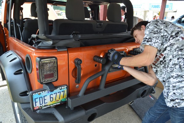 installing a swing out tire carrier on a jeep wrangler JK
