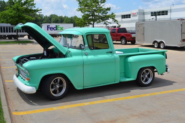 turquoise hot rod chevy pickup truck, side