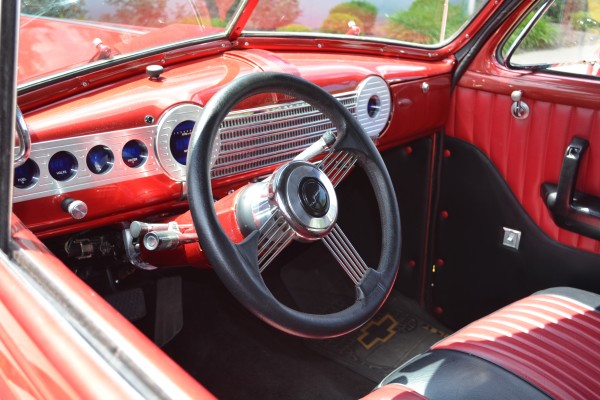 Interior of an antique car with digital gauges