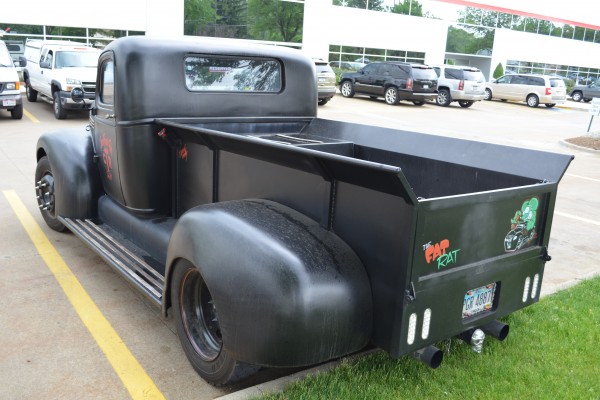 side view of a vintage dually hot rod truck