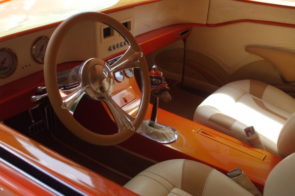 driver seat view of a custom sedan delivery hot rod