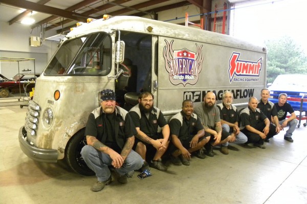 men pose with vintage chevy step Van for hot rod build