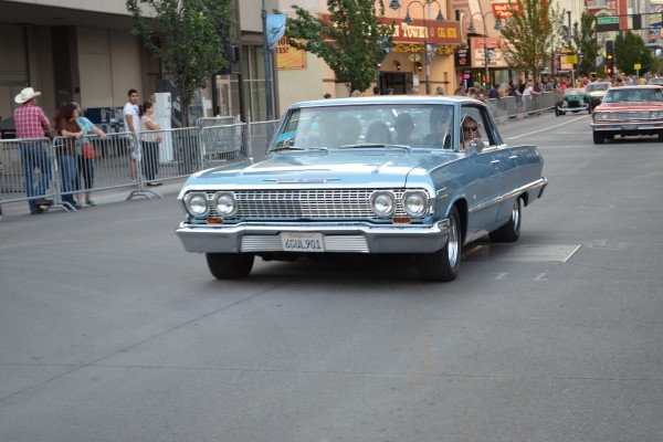 chevy impala sedan in parade Hot August Nights 2013