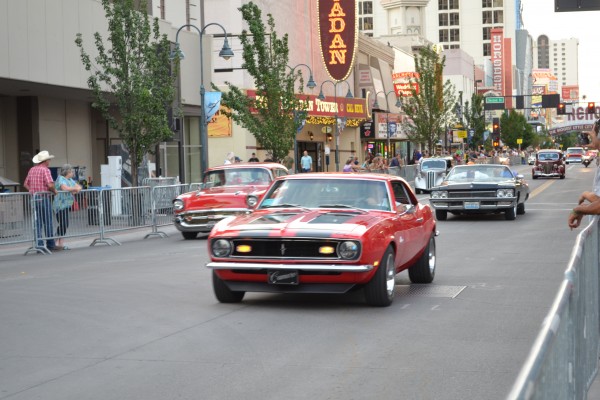 rows of vintage cars in parade during Hot August Nights 2013