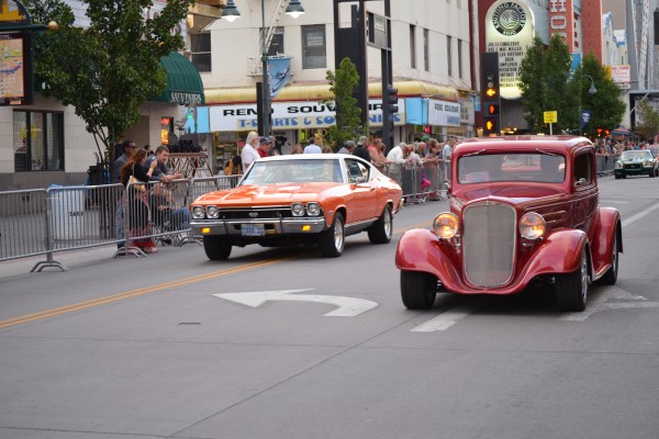 classic cars in parade during Hot August Nights 2013