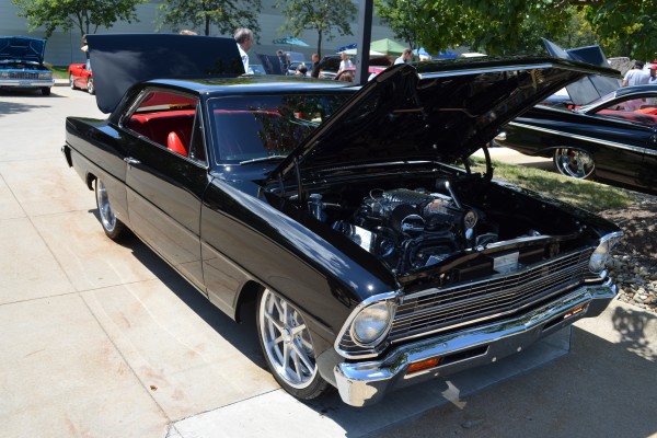 customized Chevy II Nova coupe at car show, 2013