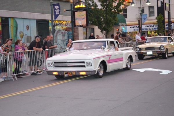 chopped truck riving in classic car parade