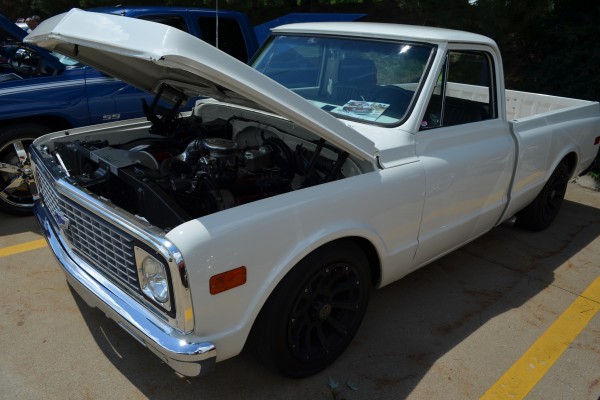 white Squarebody chevy c10 truck at Summit Racing car show, 2013