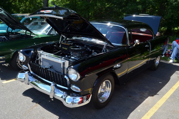 black 1955 chevy hot rod at car show, 2013
