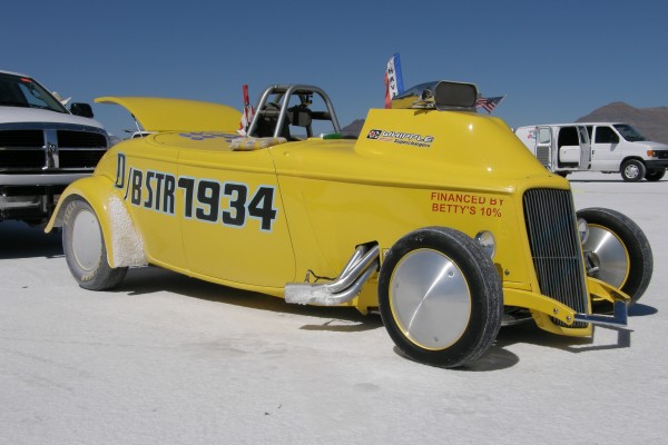 yellow hot rod racer at Bonneville Salt Flats during Speed Week