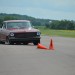 customized 1963 Chevy II Nova on autocross course thumbnail
