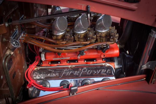 firepower hemi engine in a vintage plymouth coupe