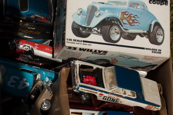 collection of vintage toy model kits in a box