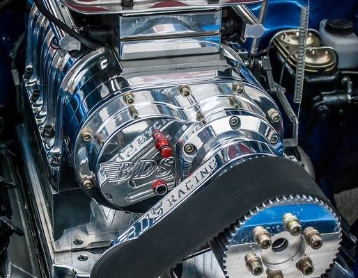 supercharged v8 engine in a custom muscle car