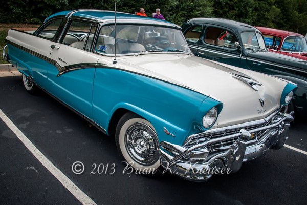 white 1950s ford fairlane two door coupe