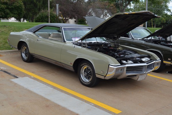 buick riviera coupe at a car show