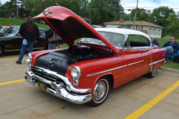 1953 oldsmobile coupe at car show