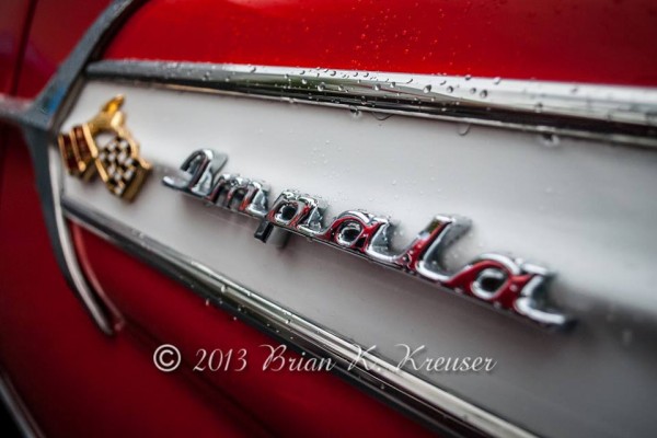 Rear quarter fender badge on a 1960 Chevy Impala