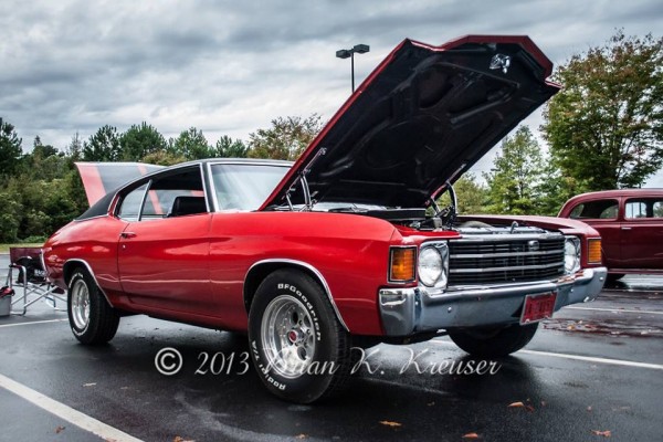 second gen chevy chevelle ss fastback coupe at a car show