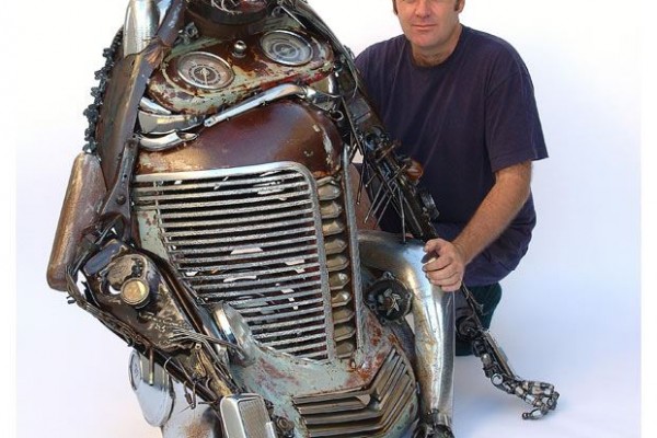 man with gorilla mechanical art sculpture
