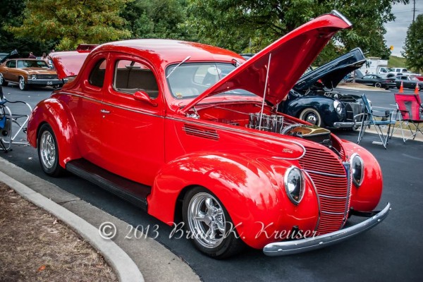 red ford prewar five window hotrod coupe with velocity stack intake