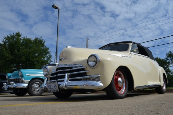 1948 Chevy Fleetmaster and 1956 Chevy parked at Summit Racing in Akron