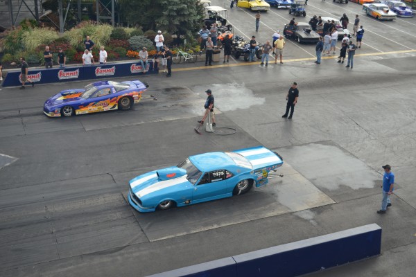 overhead view of a pair of drag race cars before the race
