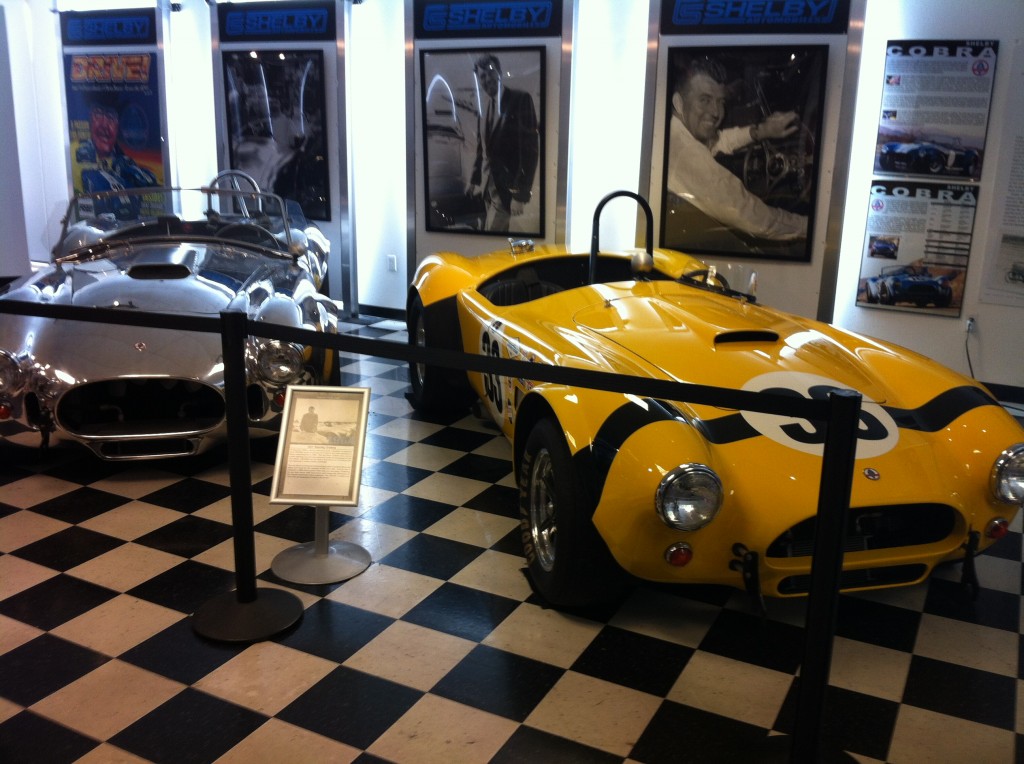 a pair of historic shelby cobra coupes at Carrol Shelby museum
