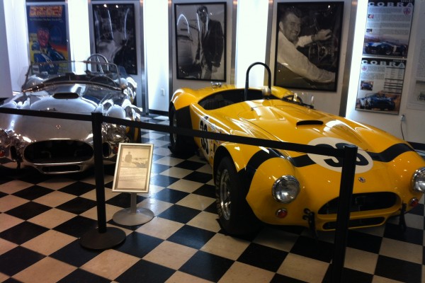 a pair of historic shelby cobra coupes at Carrol Shelby museum