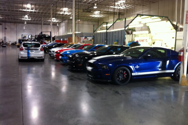 cars lined up for upgrades at Carrol Shelby factory