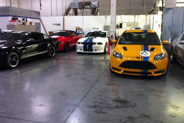 Customer cars at Carrol Shelby facility