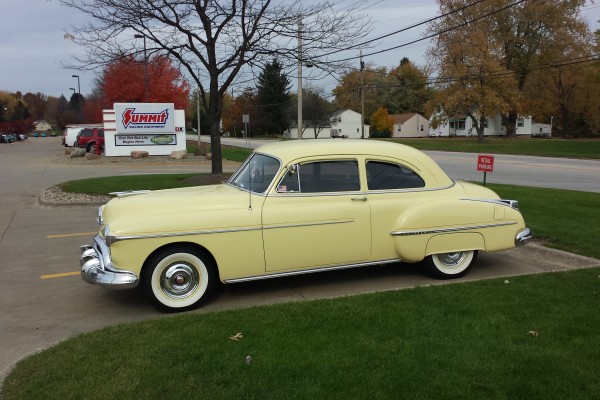 1950 Oldsmobile 88 coupe parked at Summit Racing in Akron, Ohio