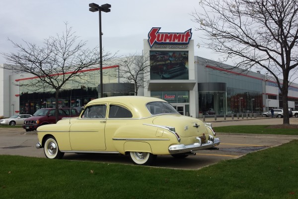 1950 Oldsmobile 88 coupe parked at Summit Racing
