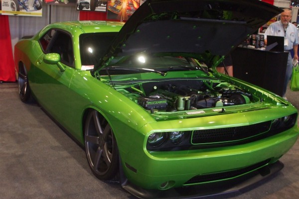 customized late model dodge challenger with green paint