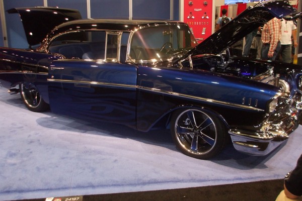customized 1957 chevy with flamed blue paint job