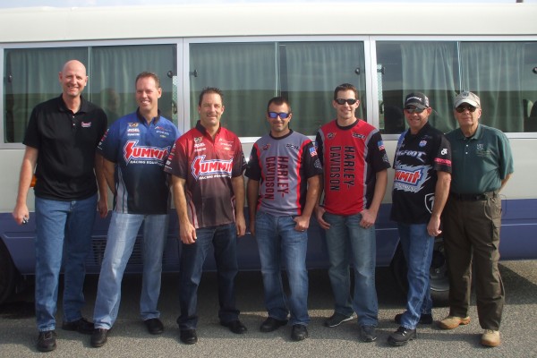 nhra drivers pose for a photo during overseas military base visit